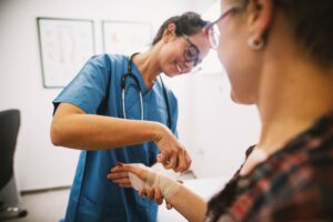 woman being bandaged at a wound care center