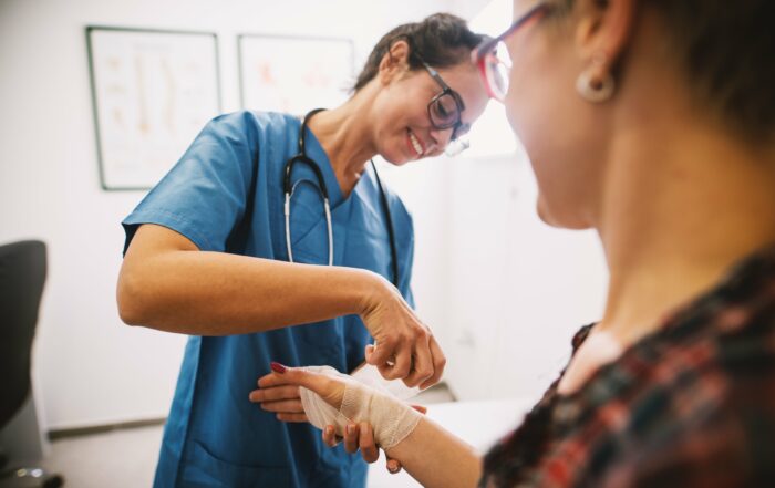 woman being bandaged at a wound care center